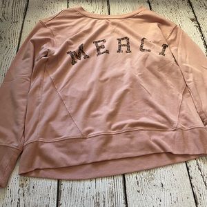 pink crew neck sweater